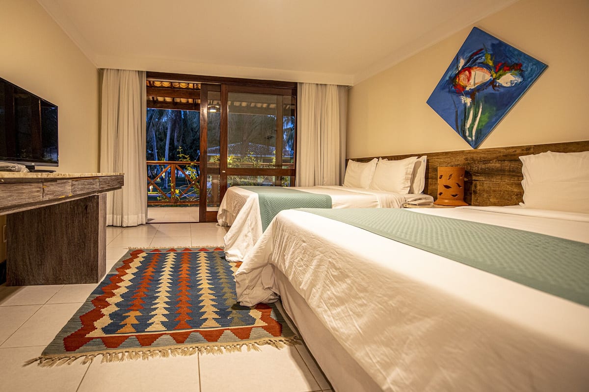 deluxe quadruple room, 2 double beds | 1 bedroom, minibar, in-room safe, blackout curtains