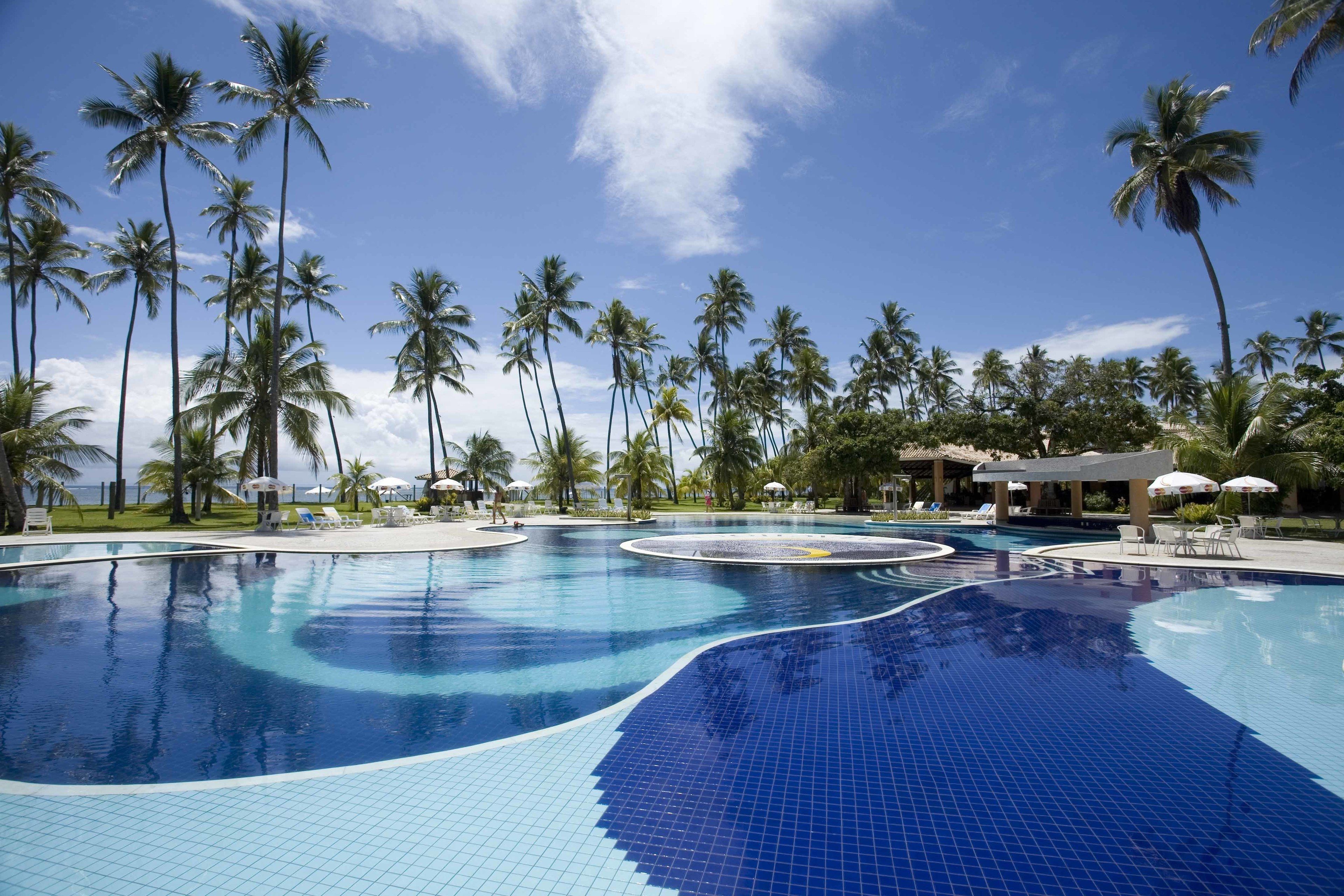 outdoor pool, pool umbrellas, pool loungers