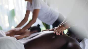 Expert massage therapy takes place in a serene, professionally designed space.