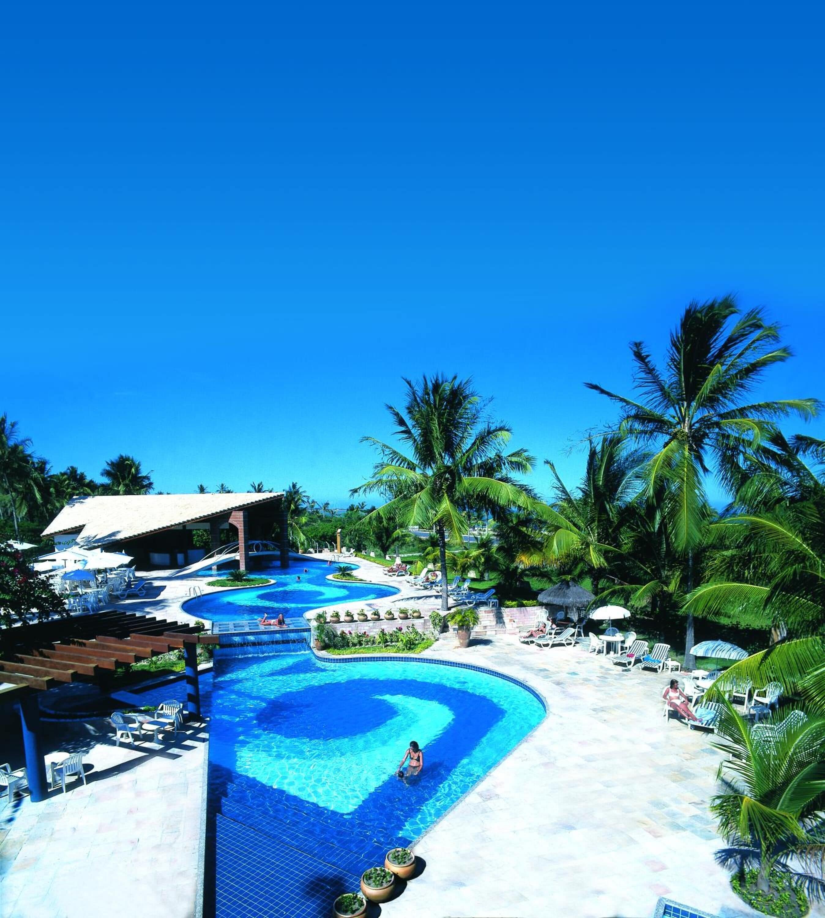 outdoor pool, pool umbrellas, pool loungers