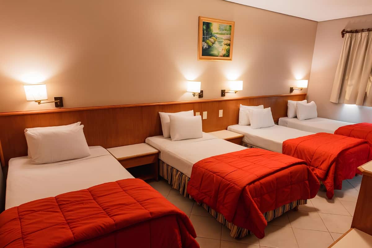 Quadruple Room | In-room safe, bed sheets