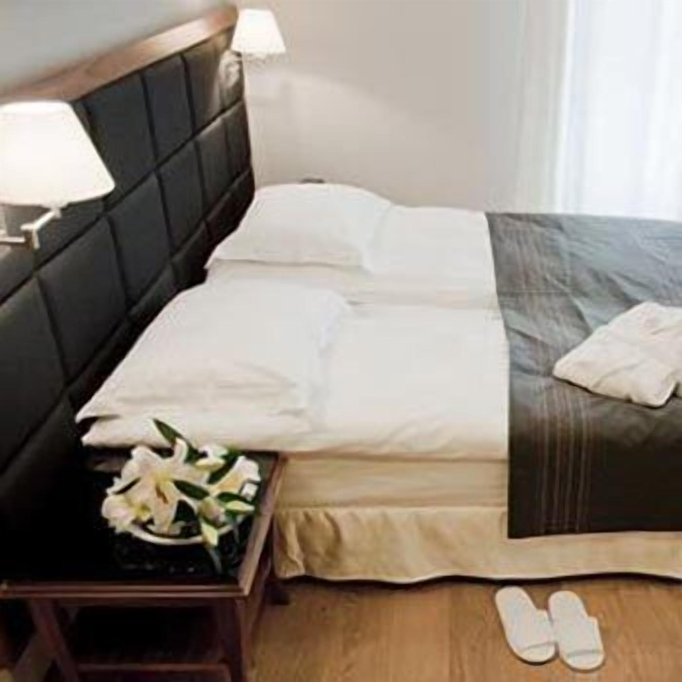 minibar, desk, blackout curtains, iron/ironing board