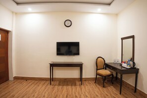 Deluxe Twin Room, 2 Twin Beds, Private Bathroom | Minibar, in-room safe, desk, blackout drapes - Hotel One Faisalabad (Faisalabad)
