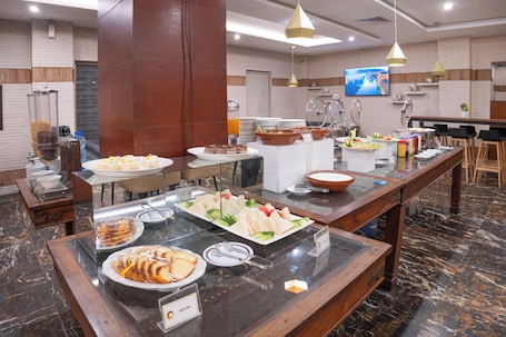 Free daily buffet breakfast . Hotel One Faisalabad