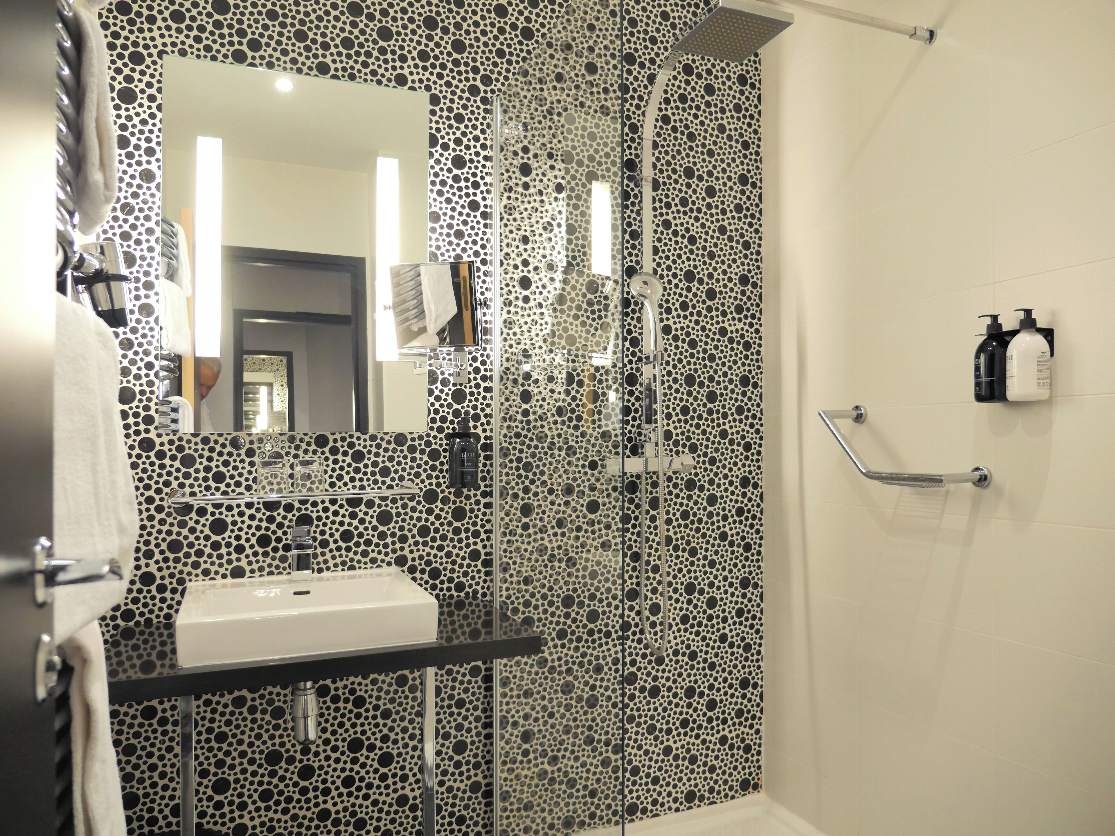 suite, multiple beds | bathroom | shower, eco-friendly toiletries, hair dryer, towels