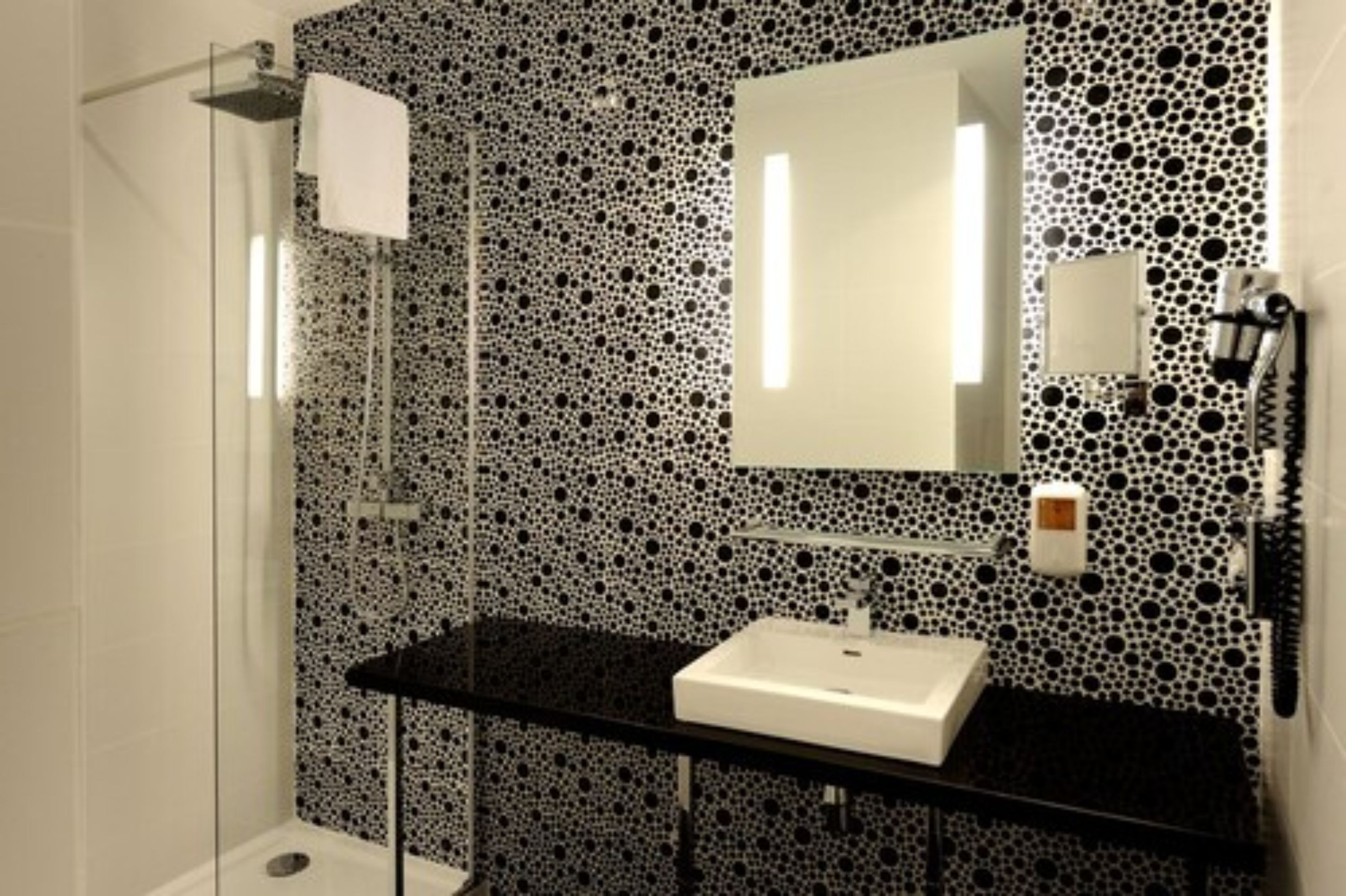 shower, eco-friendly toiletries, hair dryer, towels