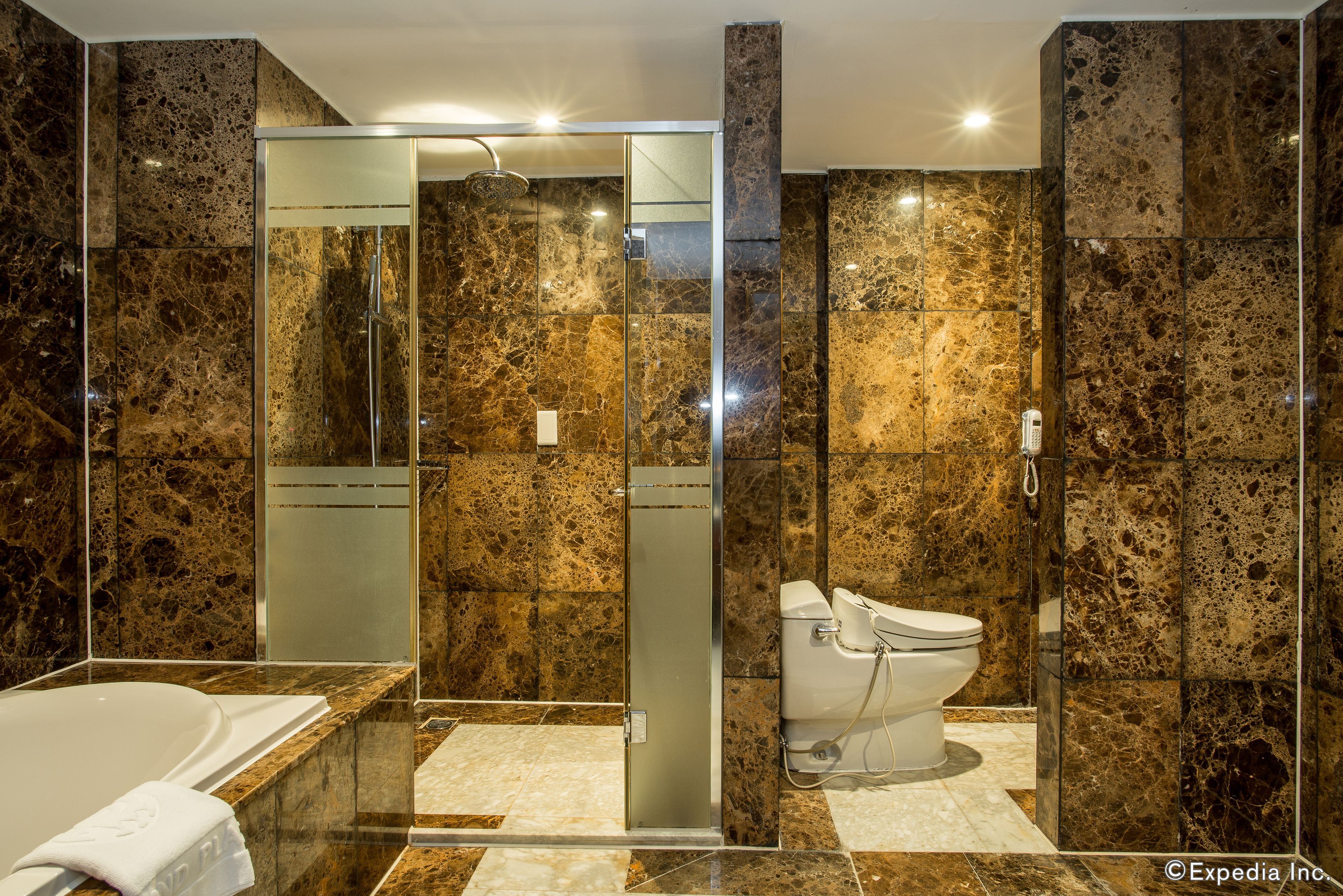 executive suite, 1 king bed | bathroom | combined shower/bathtub, hair dryer, bathrobes, slippers