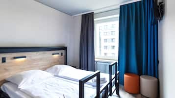 Blackout curtains, iron/ironing board, free WiFi, bed sheets