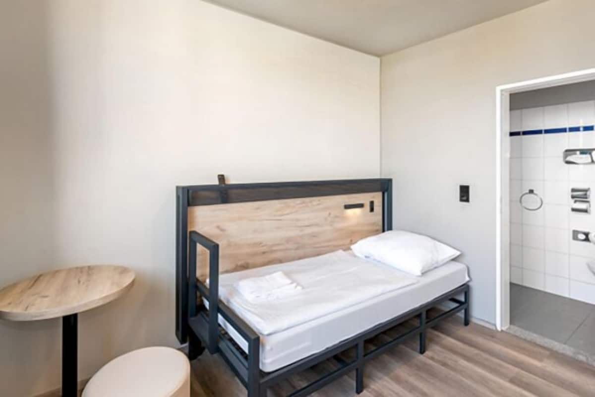 Blackout curtains, iron/ironing board, free WiFi, bed sheets