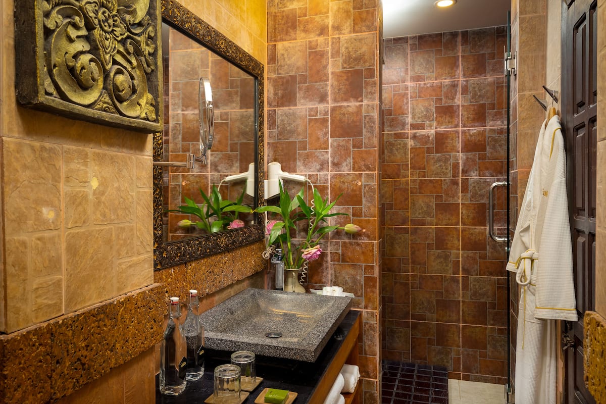 shower, rainfall showerhead, designer toiletries, hair dryer