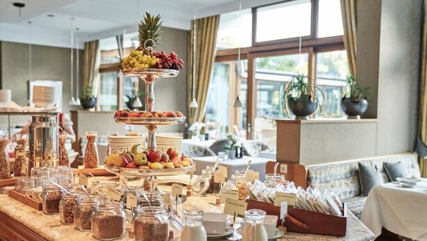 A breakfast buffet with various food items and condiments. - Hotel Deimann (Schmallenberg)