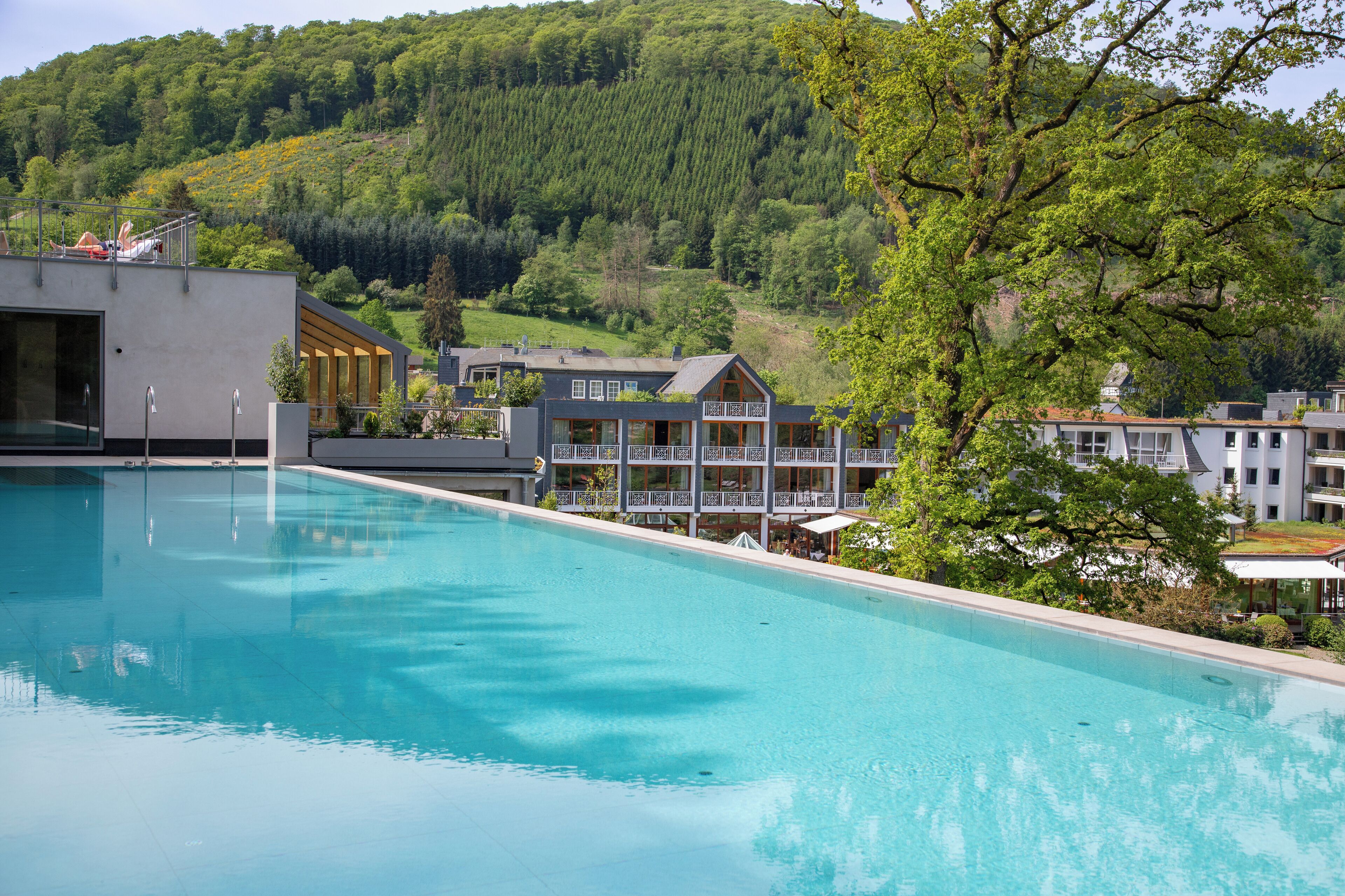 indoor pool, outdoor pool, open 7:00 am to 8:00 pm, pool loungers