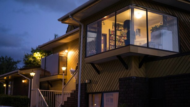 A two-story house with a balcony, a staircase, and a garage. - Ace Motor Lodge (Rotorua)