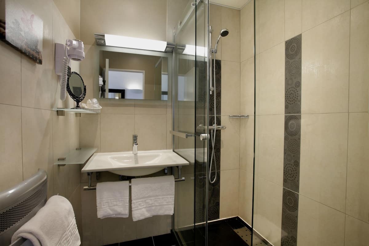 shower, hair dryer, bathrobes, towels