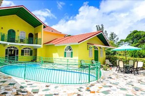 Outdoor pool, pool umbrellas, pool loungers