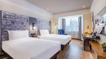 Ropa de cama de alta calidad y minibar