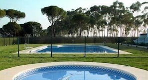 Seasonal outdoor pool, pool umbrellas, pool loungers