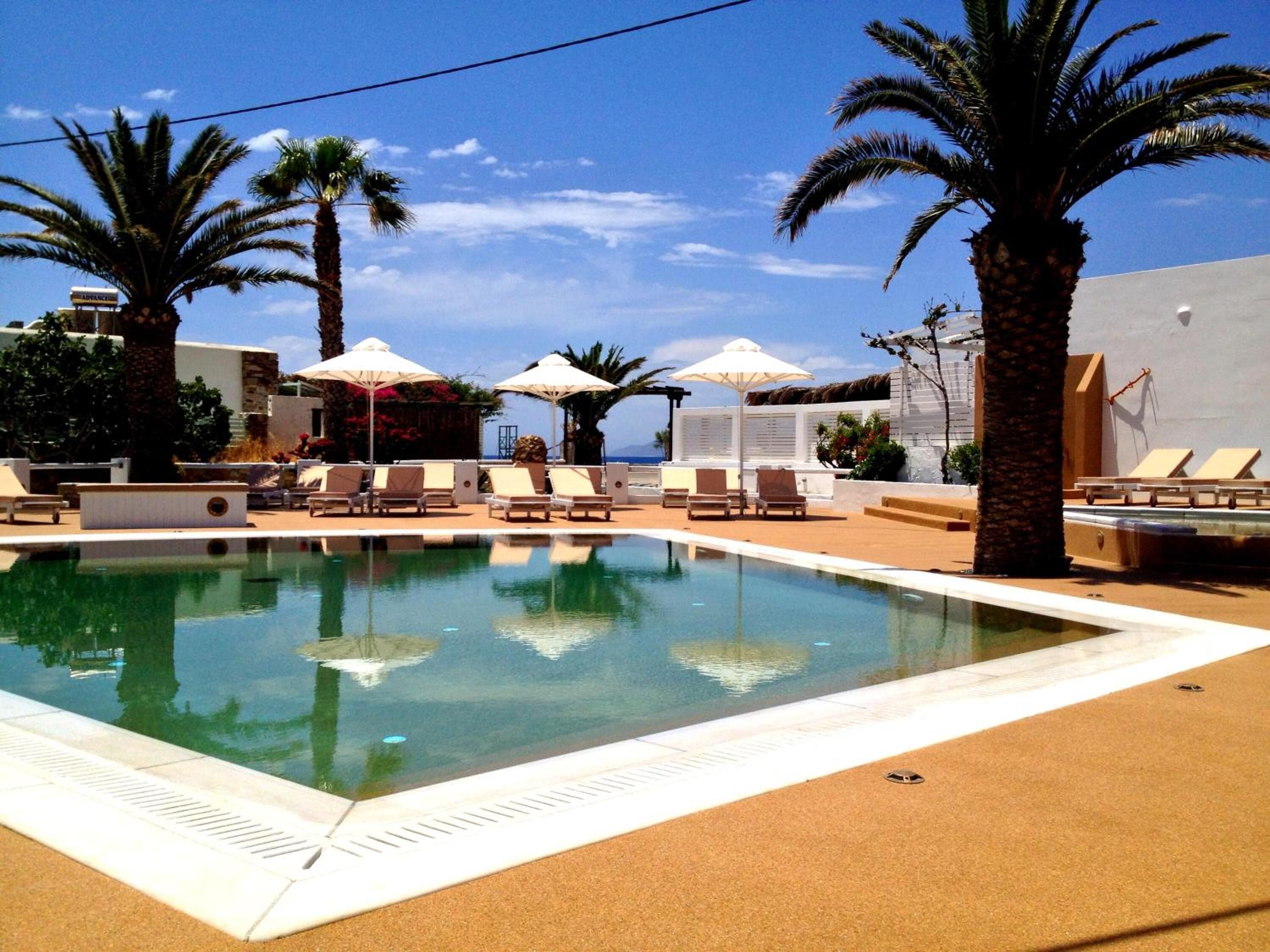 2 outdoor pools, pool umbrellas, pool loungers