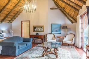 Suite | Area soggiorno | TV a schermo piatto 0 pollici con canali via cavo, TV