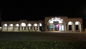 A building with a sign reading "LACOMBE MOTOR INN LOBBY". - Lacombe Motor Inn (Lacombe)