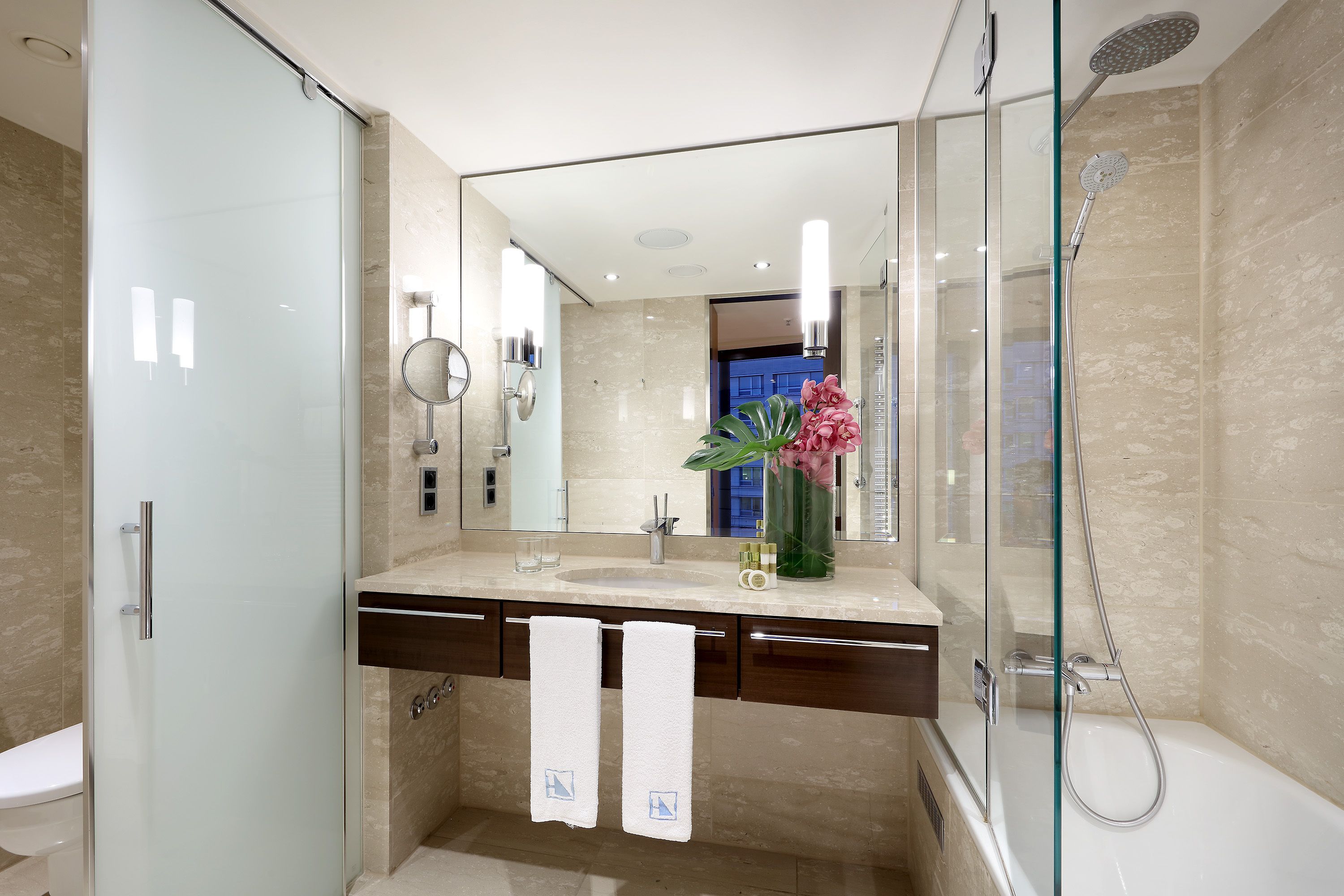 eco-friendly toiletries, hair dryer, bathrobes, slippers