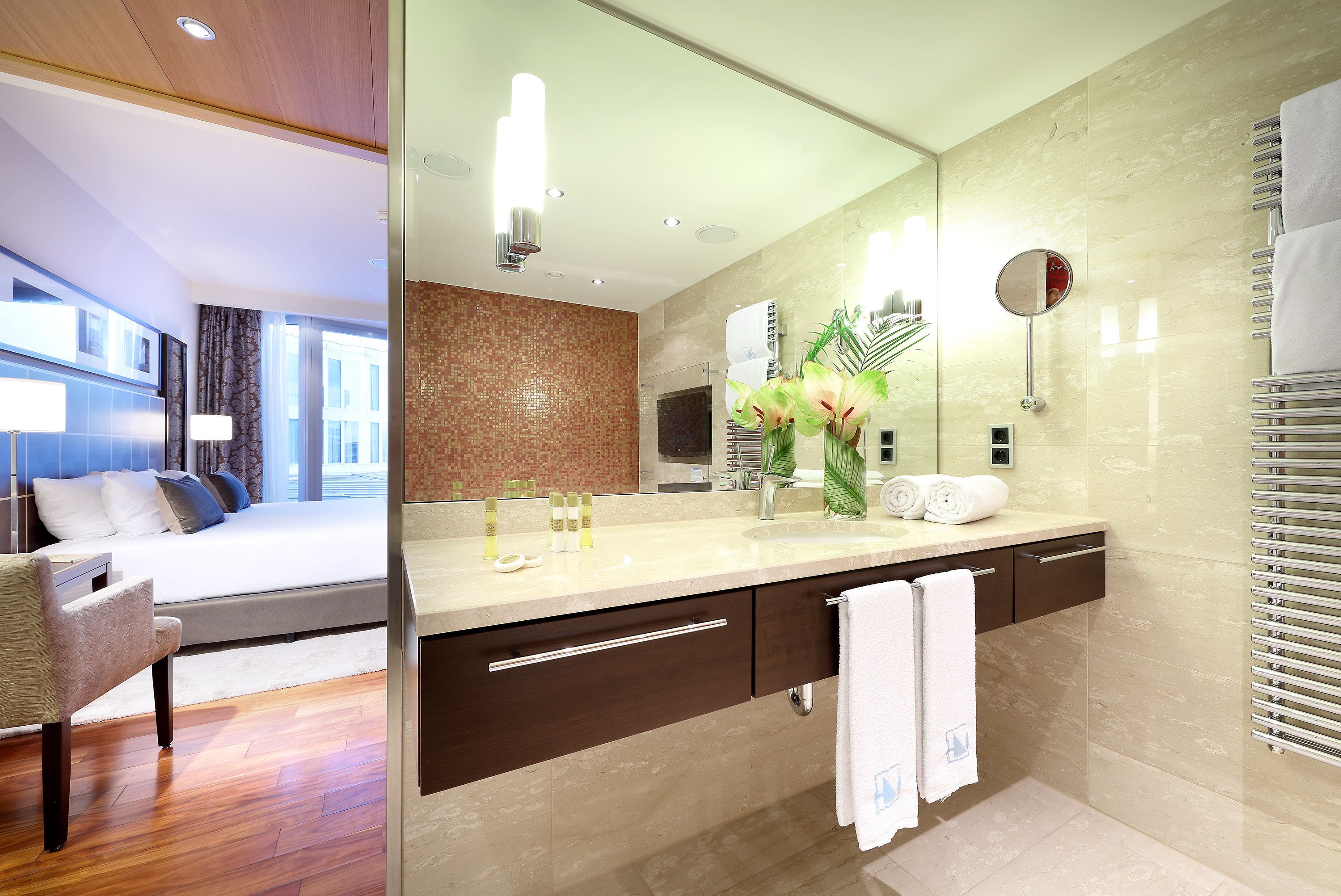 eco-friendly toiletries, hair dryer, bathrobes, slippers