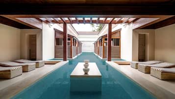 Indoor pool, outdoor pool, pool umbrellas, pool loungers