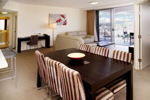 Two Bedroom Apartment | Living area | 32-inch plasma TV with cable channels, TV