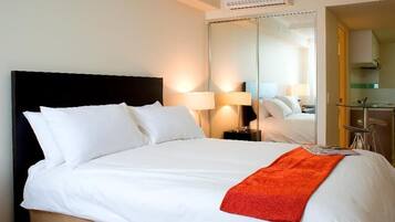 Studio | Premium bedding, pillow-top beds, desk, blackout curtains