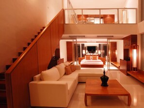 2 Bedroom Cozy Grande Suite | Living area | 29-inch LCD TV with cable channels, TV