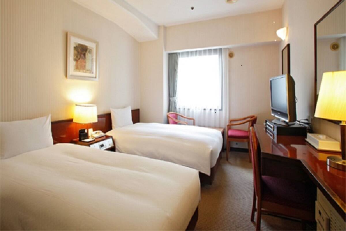 Desk, blackout drapes, iron/ironing board (on request), WiFi (free)