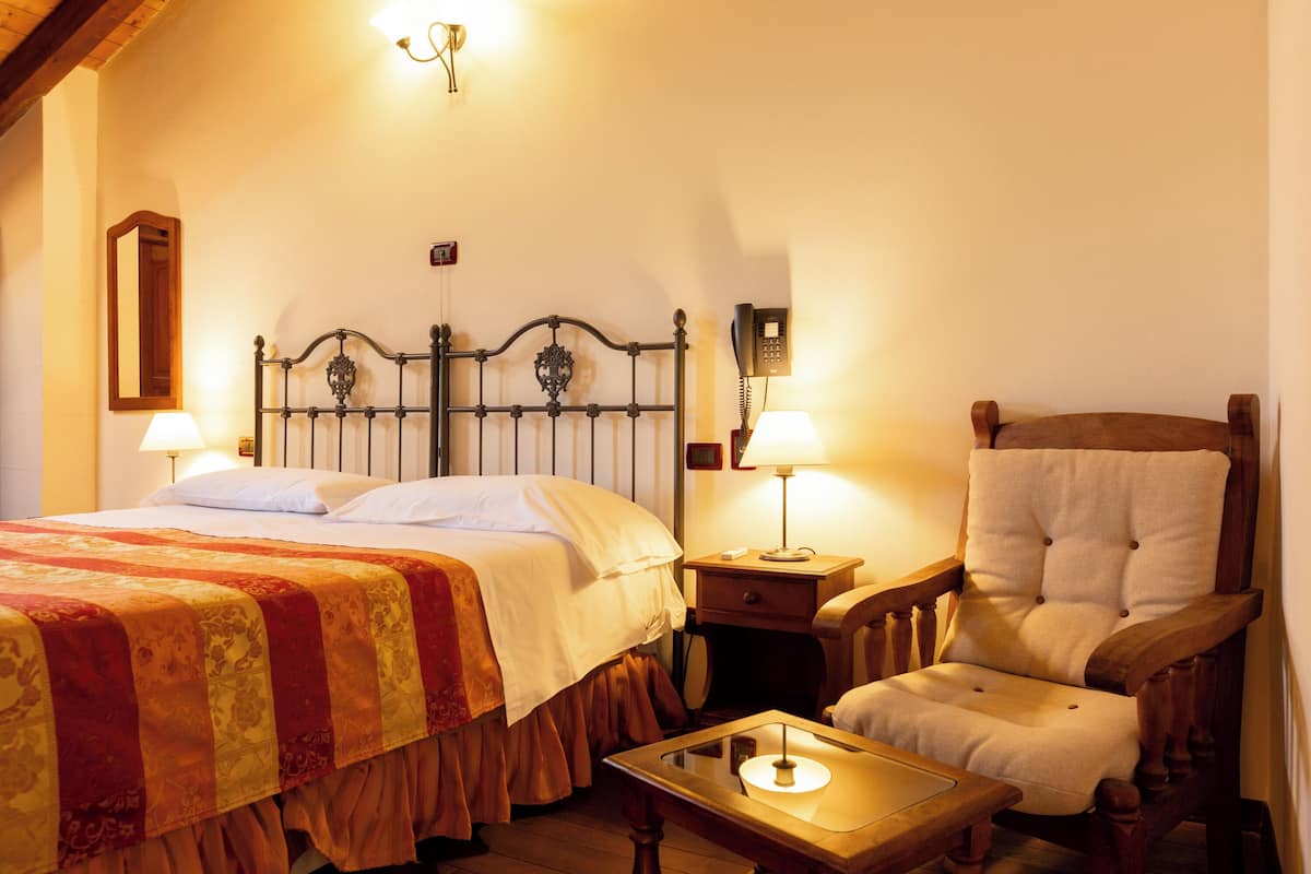 Suite junior | Sábanas de algodón egipcio y minibar