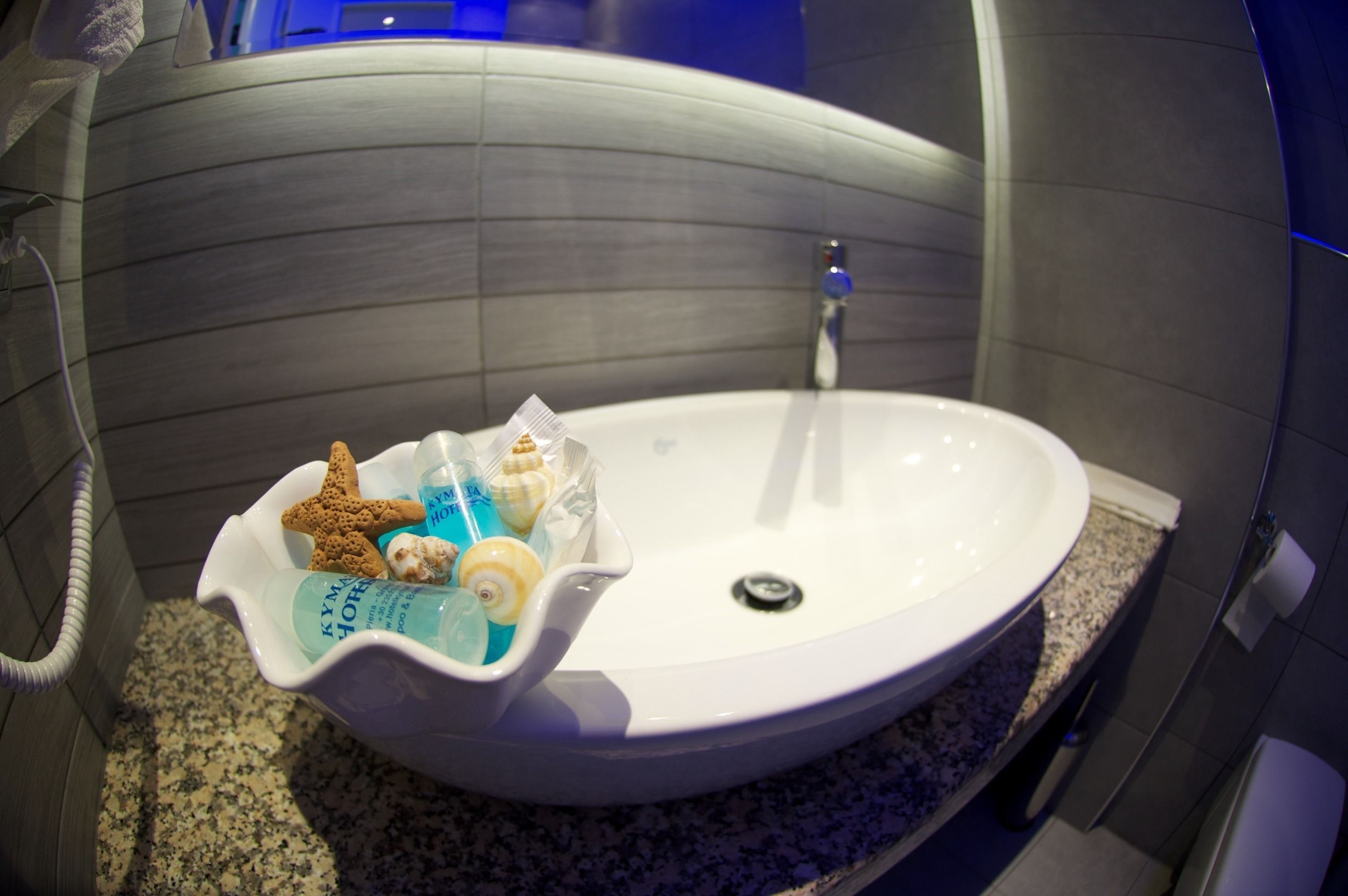 luxury double room, sea view | bathroom | hair dryer, towels