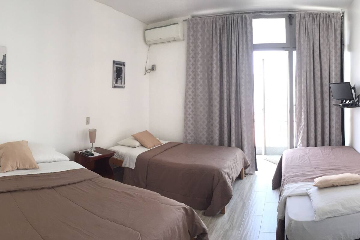 Premium bedding, down duvets, laptop workspace, iron/ironing board