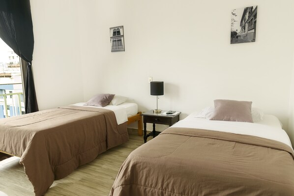 Premium bedding, down duvets, laptop workspace, iron/ironing board
