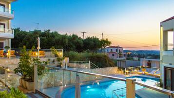 Seasonal outdoor pool, pool umbrellas, sun loungers