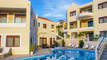 Seasonal outdoor pool, pool umbrellas, sun loungers