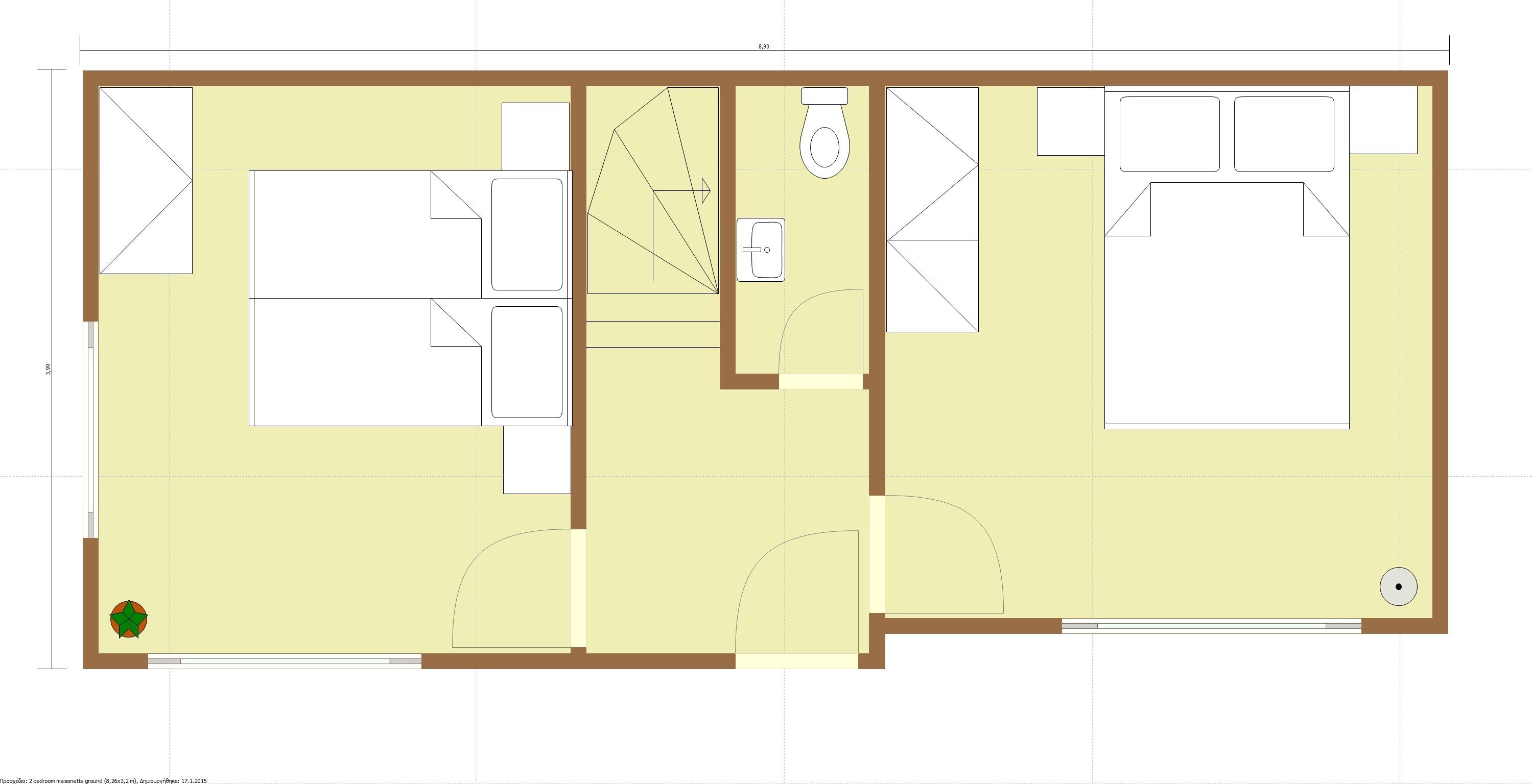 A floor plan of a hotel room with a large bed, a small bathroom, and a kitchenette.