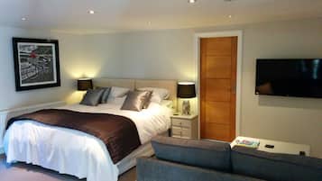 Family Studio Suite, 2 Bedrooms | Living area | 19-inch flat-screen TV with digital channels, TV