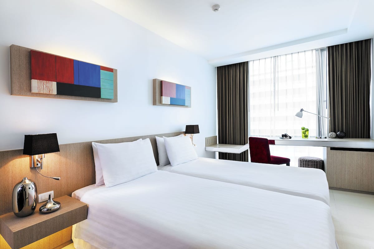 Executive studio, 2 eenpersoonsbedden | Een kluis op de kamer, een bureau, verduisterende gordijnen, gratis wifi