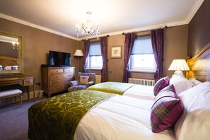 Premium bedding, in-room safe, individually decorated