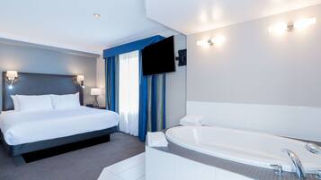 Suite, 1 cama de matrimonio grande, cocina (Jacuzzi) | Ropa de cama de alta calidad y colchones con acolchado adicional