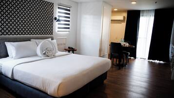 Ropa de cama de alta calidad y minibar