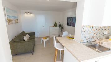 Apartemen Deluks | Area keluarga | TV