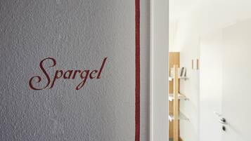 A hallway with a sign reading "Spargel" on the wall.
