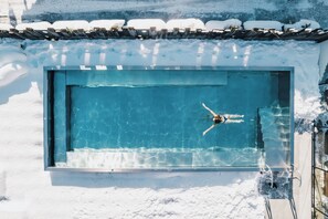 Indoor pool, seasonal outdoor pool, open 8 AM to 8:00 PM, pool umbrellas