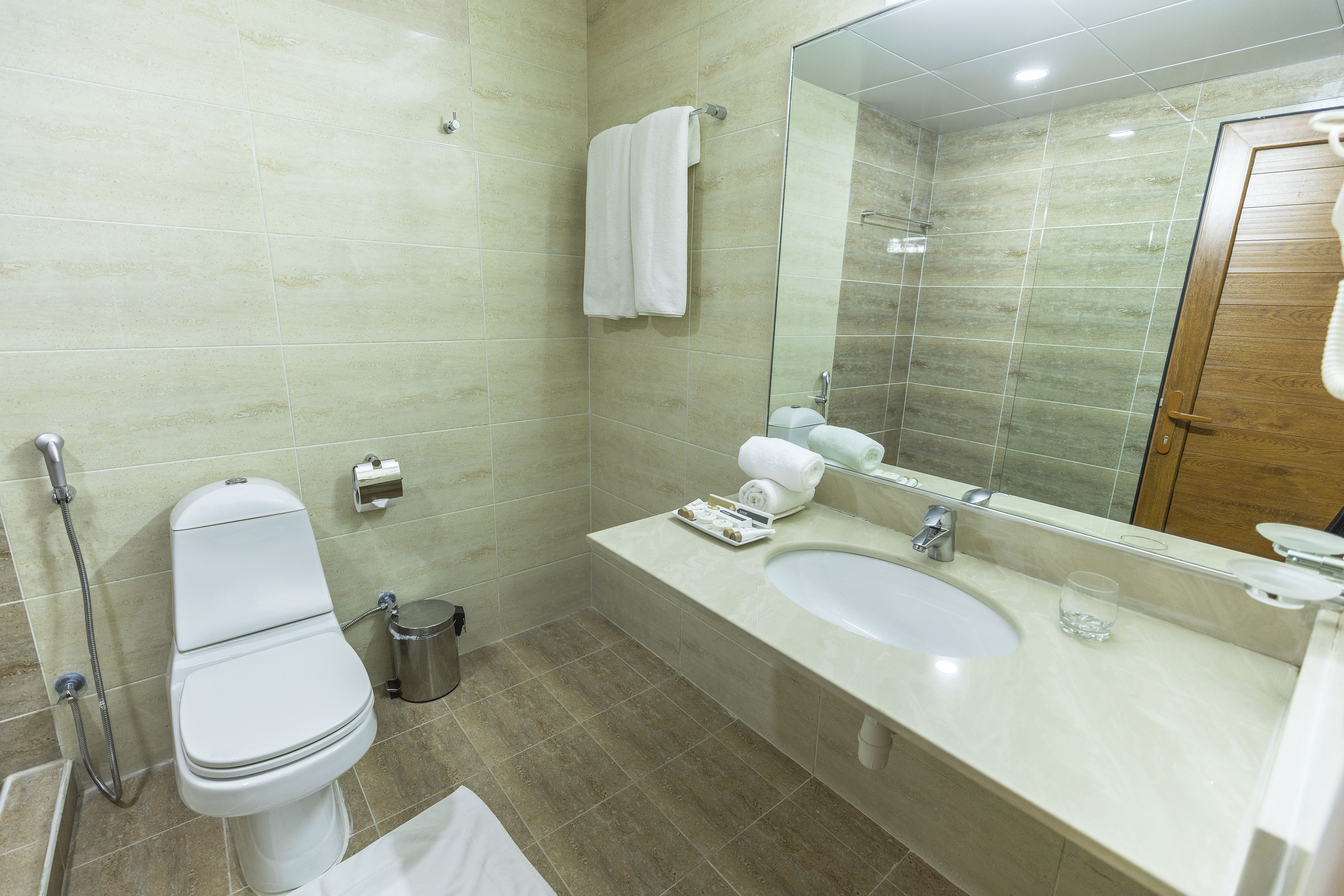 combined shower/bathtub, free toiletries, hair dryer, dressing gowns