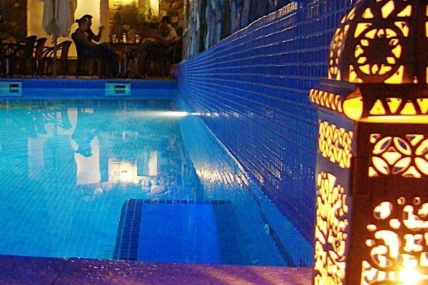 Outdoor pool, open 8 AM to 10 PM, pool umbrellas, lifeguards on site