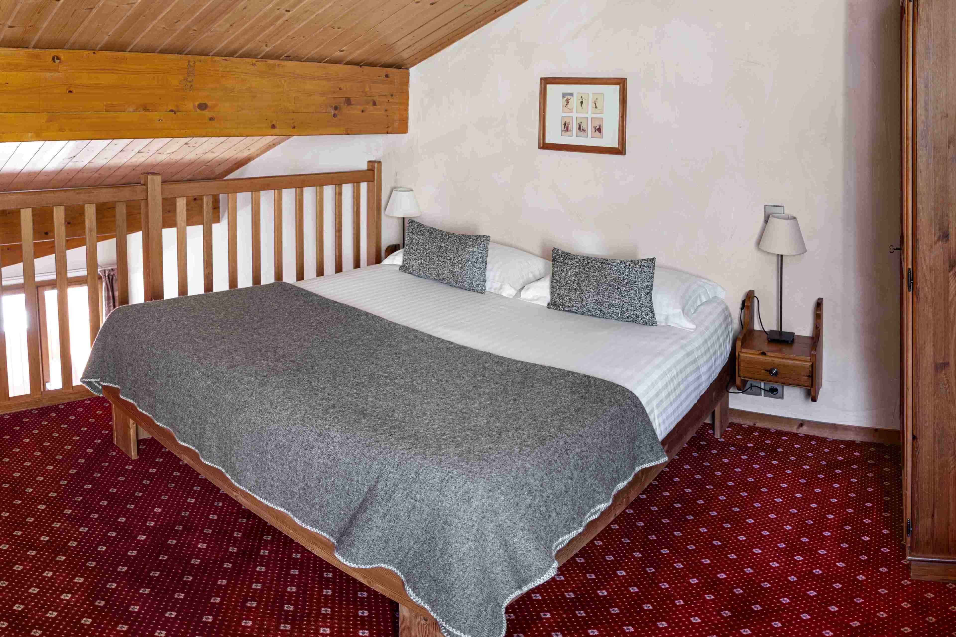 junior suite | in-room safe, desk, blackout curtains, iron/ironing board