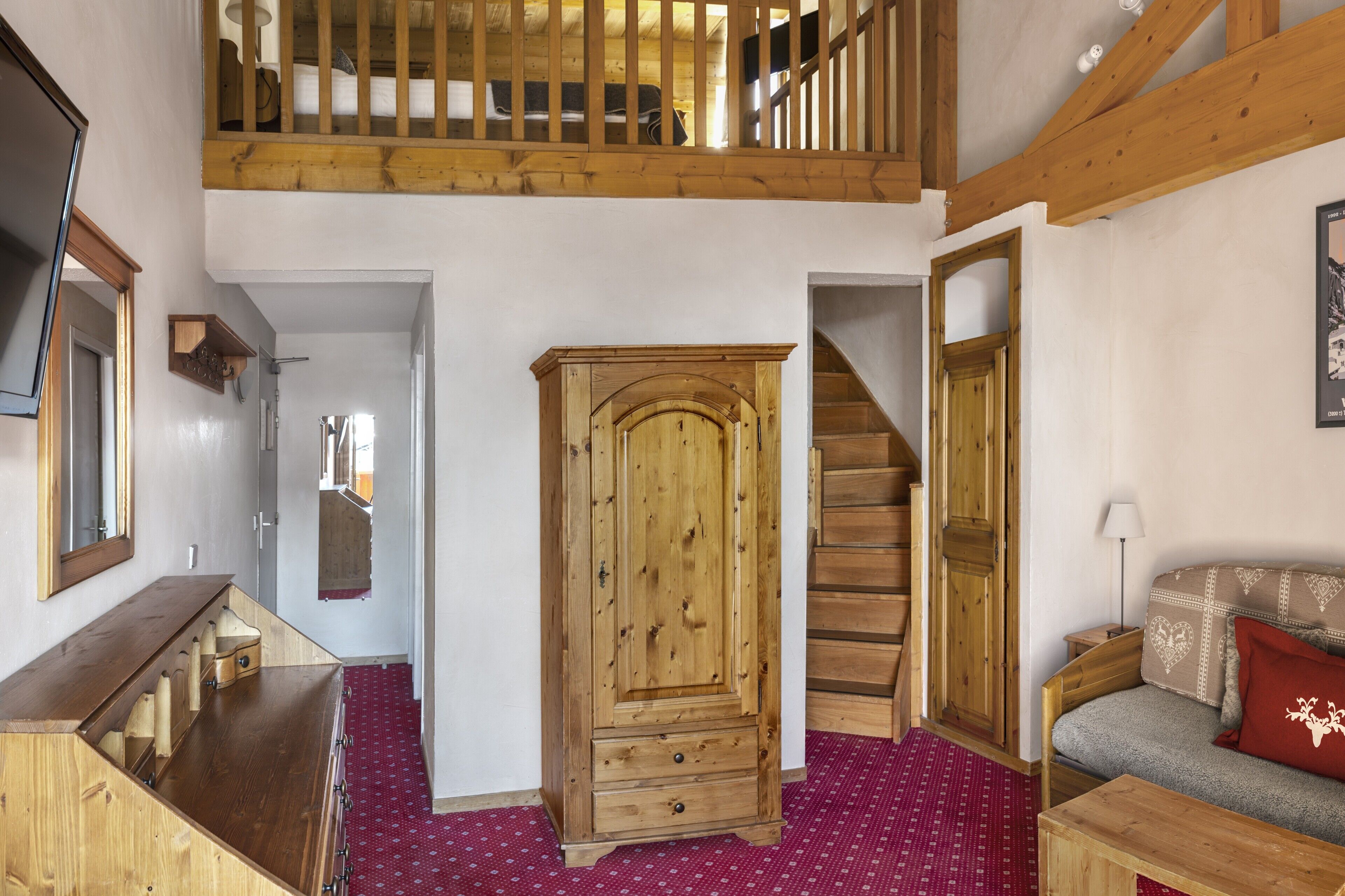 junior suite | in-room safe, desk, blackout curtains, iron/ironing board